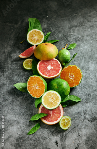 Halved citrus fruits on table