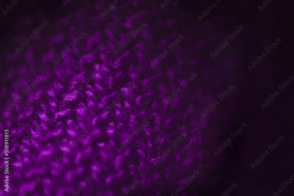 Fabric texture background of purple color (Very Peri). Close up of clothes as wallpaper. Fabric texture background of purple color (Very Peri). Close up of clothes as wallpaper.