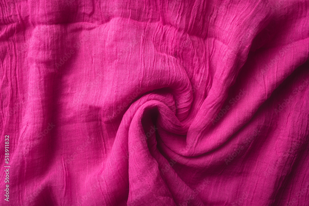 Fabric texture background of pink color. Close up of clothes as wallpaper. Fabric texture background of pink color. Close up of clothes as wallpaper.