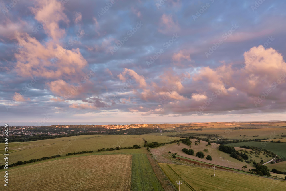 Gorgeous aerial drone landscape image of South Downs NP at sunrise in Summer
