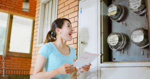 woman and electricity bill