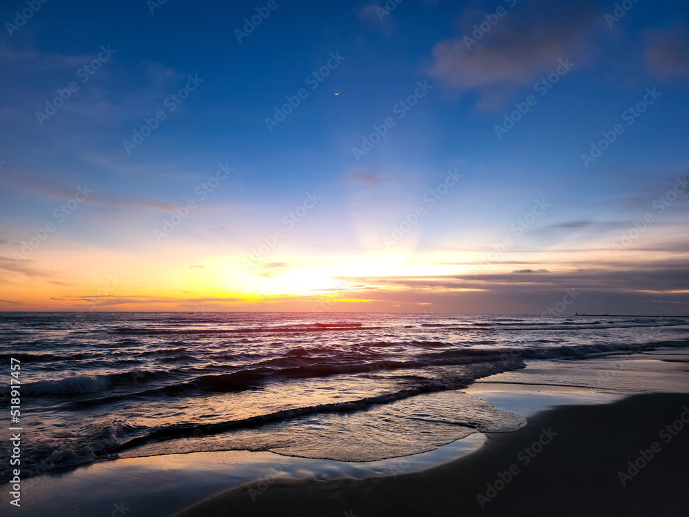 Dramatic sea sunrise or sunset