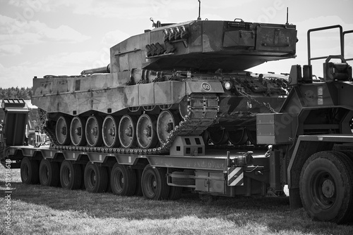 Tank Leopard on the platform. The image is black and white.