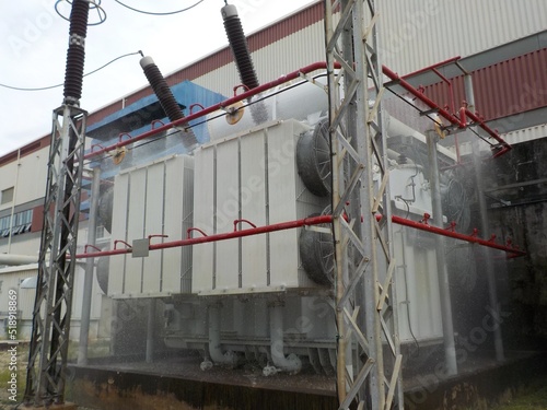 Faulty operation of the fire suppression system. The fire suppression system sprayed water into the transformer inside the power plant.
