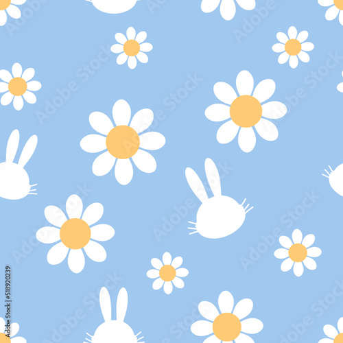 Seamless pattern with daisy flower and rabbit cartoons on blue background vector illustration. Cute childish print.