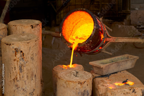 Melting bronze casting of sculpture photo