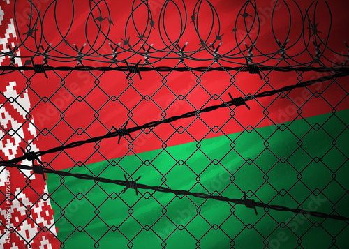 Belarus flag behind barbed wire and metal fence