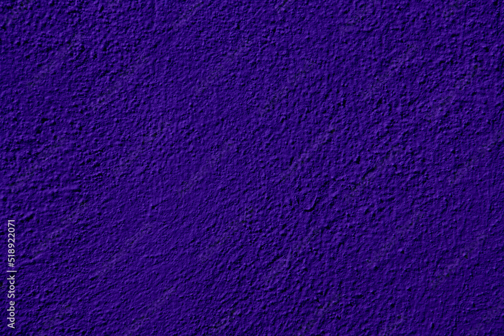 Purple colored abstract wall background with textures of different shades of violet Purple colored abstract wall background with textures of different shades of violet