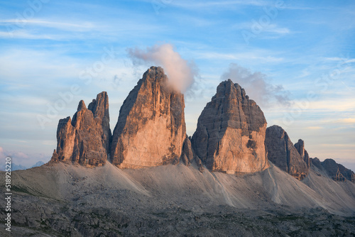 Obraz na płótnie Stunning view of the Three Peaks of Lavaredo, (Tre cime di Lavaredo) during a beautiful sunset. The Three Peaks of Lavaredo are the undisputed symbol of the Dolomites, Italy. w salonie