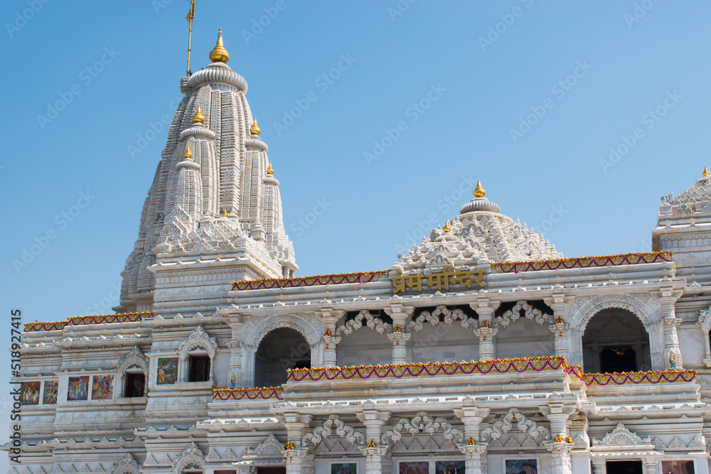 Mathura Vrindavan temple, Prem mandir with blue sky in the background , beautiful architecture. Radha Krishna temple.	