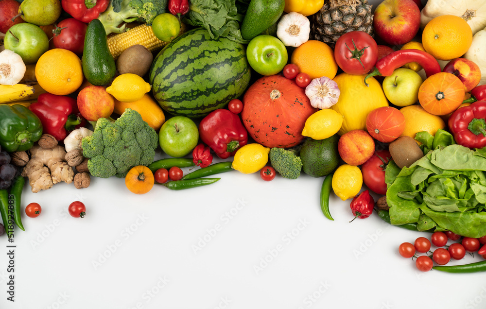 Fitness concept. Healthy nutrition: fruits and vegetables. Equipment for fitness exercises: weighing machine and dumbells. White background. Fitness concept. Healthy nutrition: fruits and vegetables. Equipment for fitness exercises: weighing machine and dumbells. White background.