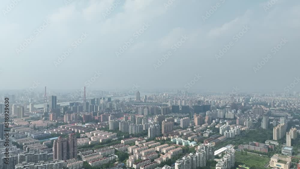 Buildings and roads in the city crowded buildings. Drone aerial view. Tones of building in downtown area Shanghai China. Economy, city scape and house development concept b-roll footage. Buildings and roads in the city crowded buildings. Drone aerial view. Tones of building in downtown area Shanghai China. Economy, city scape and house development concept b-roll footage.