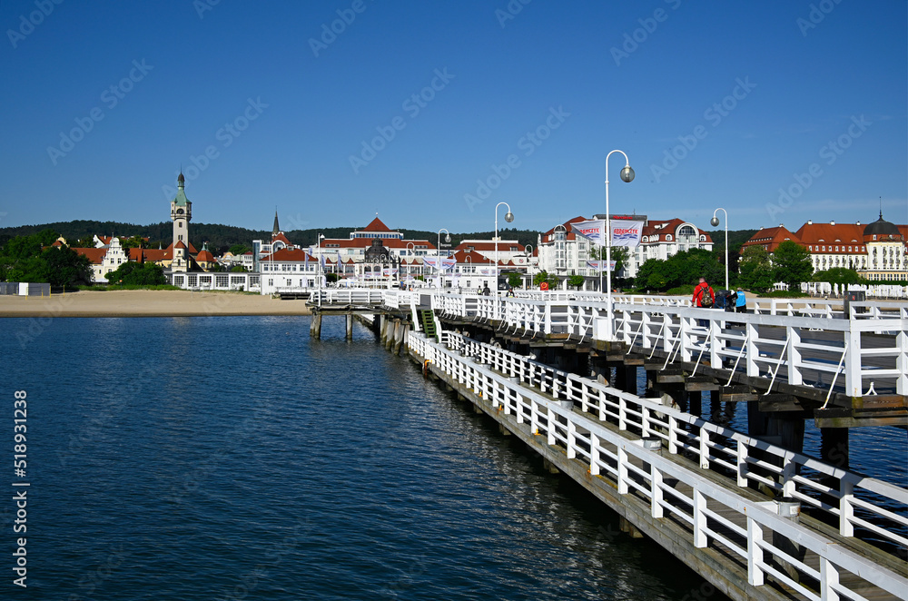 Historic lighthouse seen from pier, Sopot, Pomerania, Poland, Europe