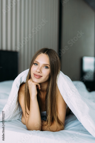 Young woman under a duvet in her bedroom © F8  \ Suport Ukraine