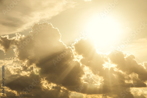 golden sky cloud light rays bright like morning heaven day and god blessing nature background photo