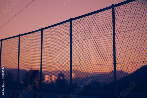 sunset and fence photo