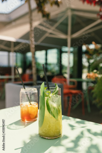 Kiwi and basil lemonade. Summer drinks on terrace. Vacation. Summer lifestyle.