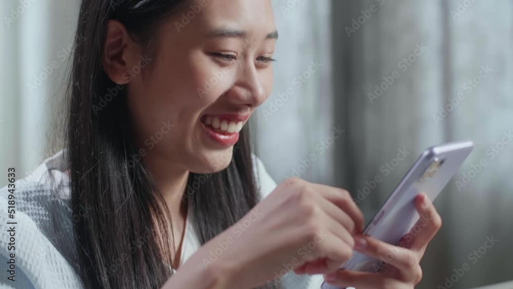 Close Up Of Smiling Asian Female Footwear Designer Using Smartphone While Working On A Laptop At Home
Close Up Of Smiling Asian Female Footwear Designer Using Smartphone While Working On A Laptop At Home