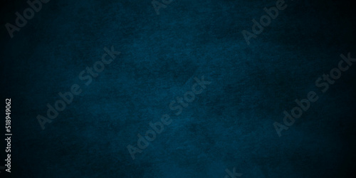 Backdrop old wall grunge pattern texture cement dark blue and abstract blue color design are light with black gradient background. panorama wall grungy textured painted concrete wall wallpaper.