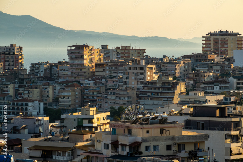 Saranda, Albania A city view and Corfu, Greece in the background.