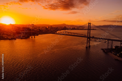 Aerial view of Hercilio luz cable bridge with sunset in Florianopolis, Brazil