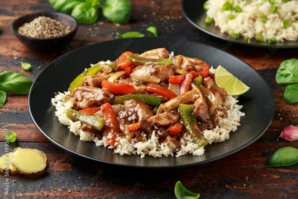 Stir fry pepper chicken with sweet peppers, onion, garlic and ginger Stir fry pepper chicken with sweet peppers, onion, garlic and ginger