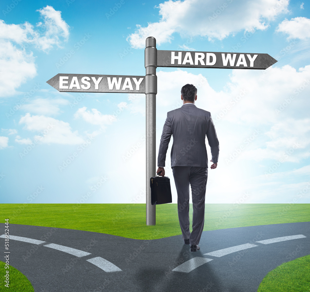 Businessman choosing between hard and easy way Businessman choosing between hard and easy way