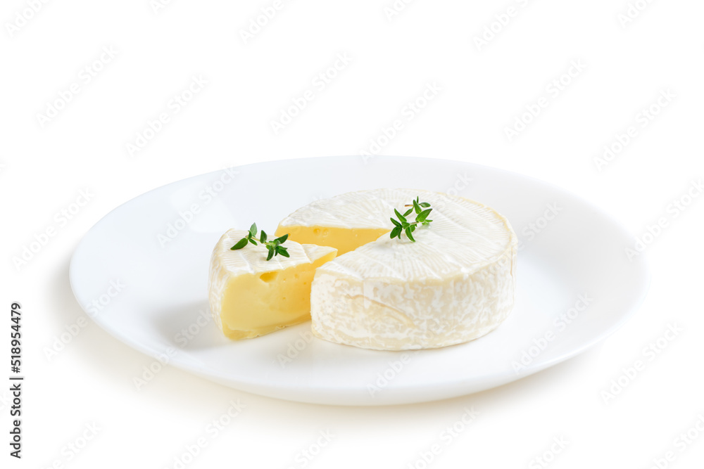 Camembert Cheese with thyme on white dish and isolated on white background.