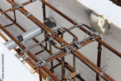 Reinforcement steel frame close up photo. Construction project in details. 