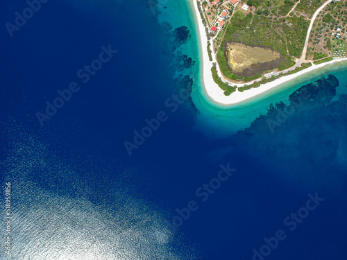 Aerial top down view of the iconic beach Agios Dimitrios in Alonissos island, Greece