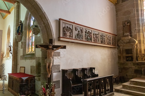 Ploumilliau (Plouilio), France. Polychrome panels of the old rood screen inside the Eglise Saint-Milliau (St Miliau Church) photo