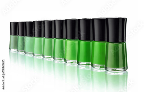 Bottles of nail polish on white background. Close up