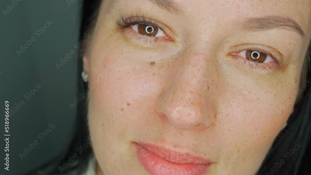 eyes of a beautiful girl close-up. lash extensions on one side, not on the other. before and after eyes of a beautiful girl close-up. lash extensions on one side, not on the other. before and after