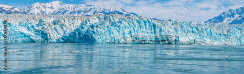 A panorama view in Disenchartment Bay across the snout of the Hubbard Glacier, Alaska in summertime © Nicola