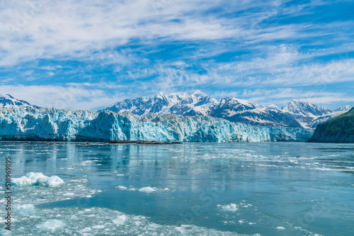 A view past icebergs in Disenchartment Bay towards in the Hubbard Glacier and Russell Fjord  Alaska in summertime