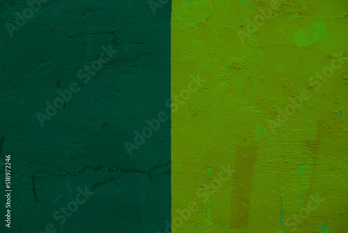 Background of two different colors of plaster on the wall.
