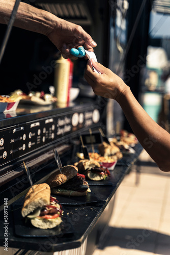 Barbecue in a food truck selling spicy sausages and chicken skewers - Alicante, Spain