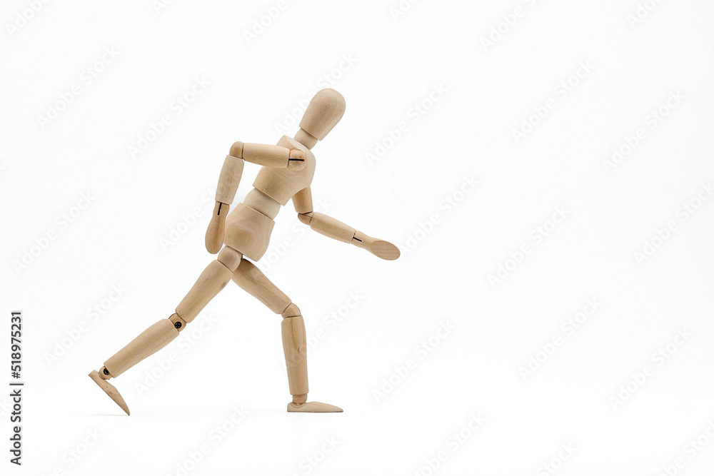 Wooden mannequin on white background. Running concept. Wooden mannequin on white background. Running concept.