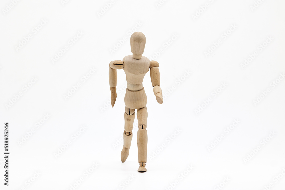 Wooden mannequin on white background. Running concept. Wooden mannequin on white background. Running concept.