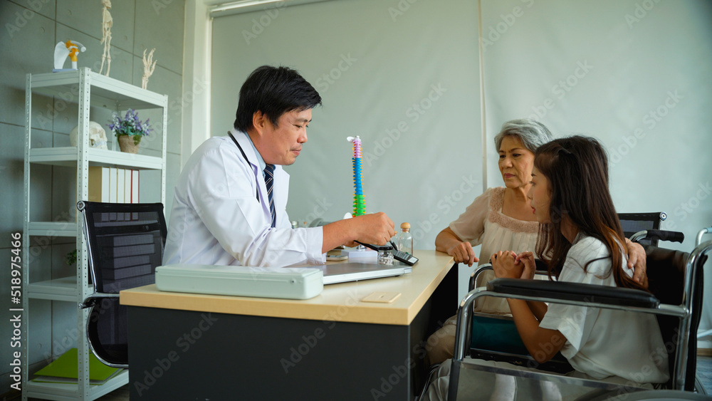 Male doctor is recommending an orthopedic treatment program for an elderly woman who brought her daughter to the hospital. Male doctor is recommending bone tonics to young women with spinal problems.