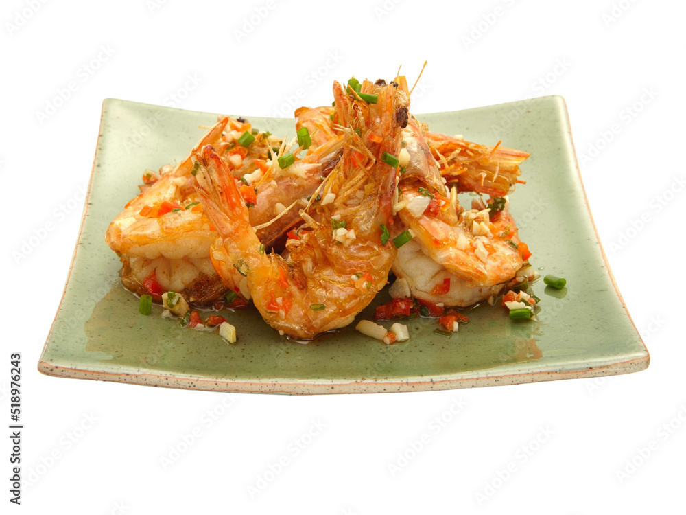Stir fried prawns with chili sauce on green square plate