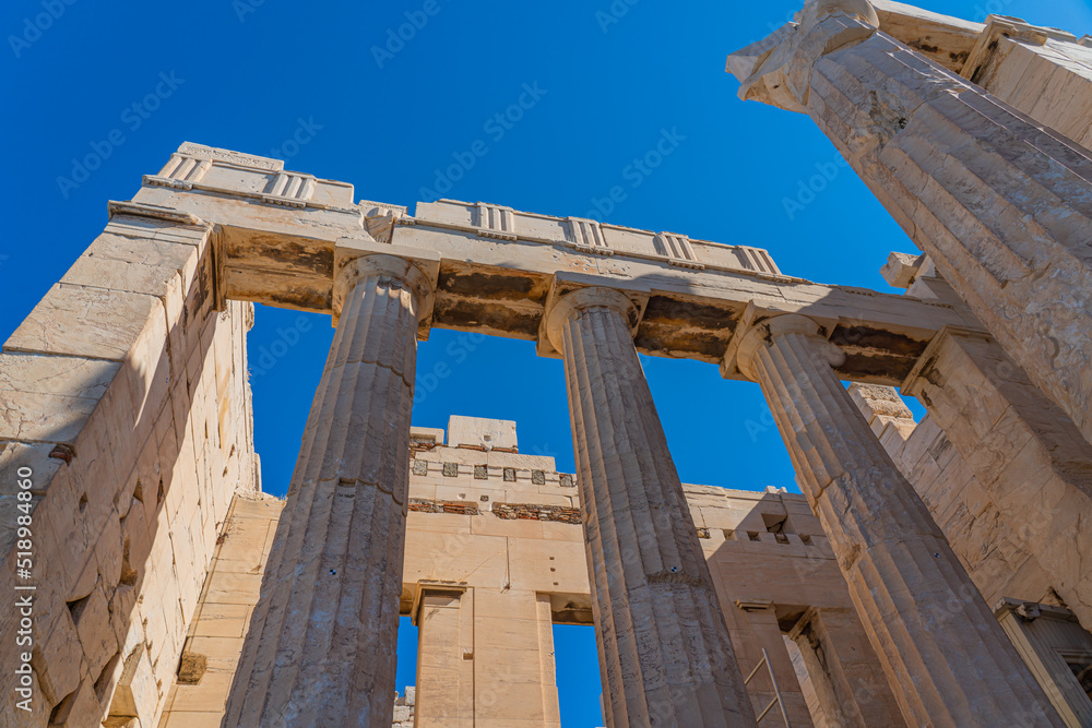 Columns of Athena Nike temple on Acropolis, landmark of Athens. Scenic view of classical building on famous Acropolis hill