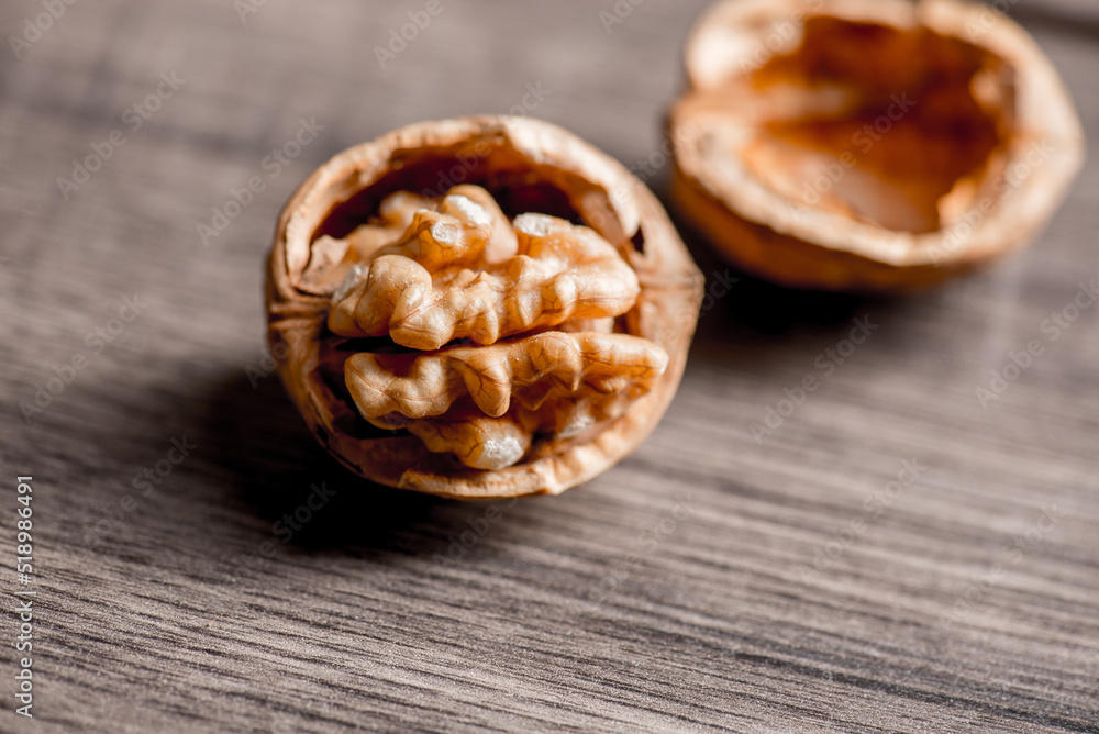Healthy bio walnuts on wood desk with detail background, walnut on wood kitchen underlay. Healthy bio walnuts on wood desk with detail background, walnut on wood kitchen underlay.