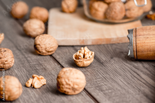 Walnuts kernels on wood desk with detail background, walnut on wood kitchen underlay.