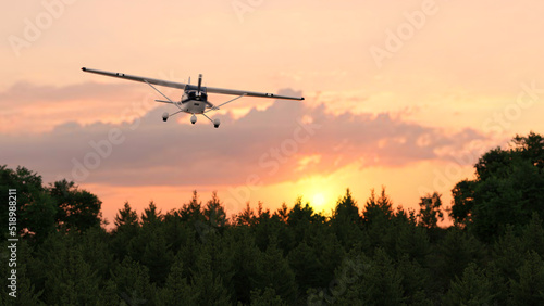 Airplane is flying over low clouds and mountains with autumn forest. Amazing landscape with passenger airplane, trees, mountains, blue cloudy sky. Passenger aircraft. Business travel. Commercial plane