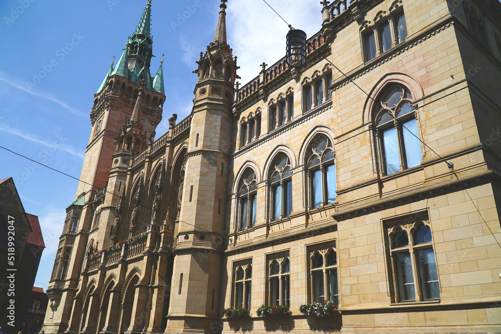 Obraz premium Historic town hall of Braunschweig, Lower Saxony, Germany. The tower and the neo-Gothic building were built between 1894 and 1900.