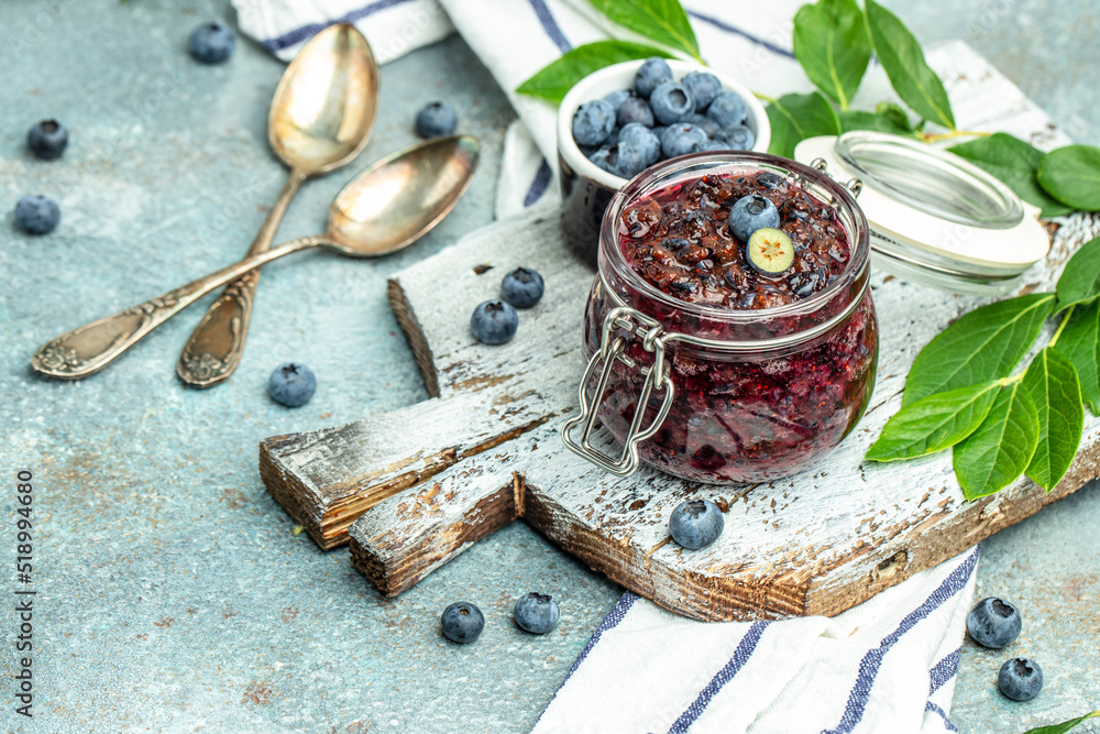 blueberry jam in a jar. Homemade food concept. place for text, top view blueberry jam in a jar. Homemade food concept. place for text, top view