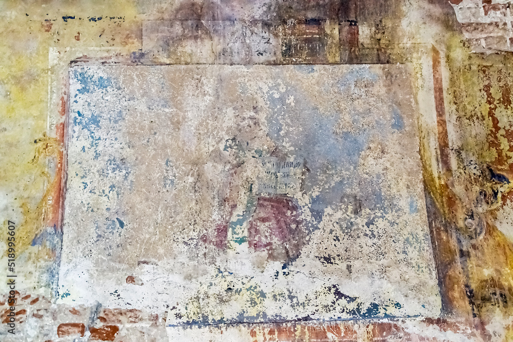 Naklejka premium pictures on the wall of an abandoned temple