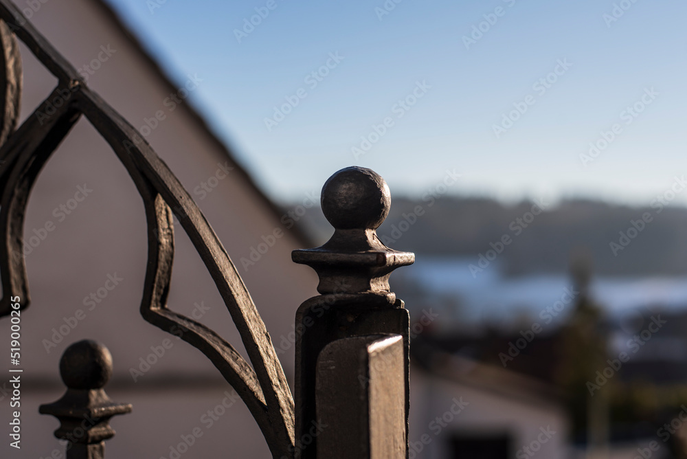 a sphere shaped post head at a gate