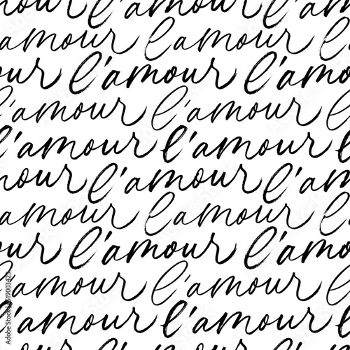 Seamless pattern with Love phrase in French language. Romantic pattern with calligraphy text. Handwritten word Love. Valentine's Day greeting card, poster, wrapping paper. Black vector lettering.
